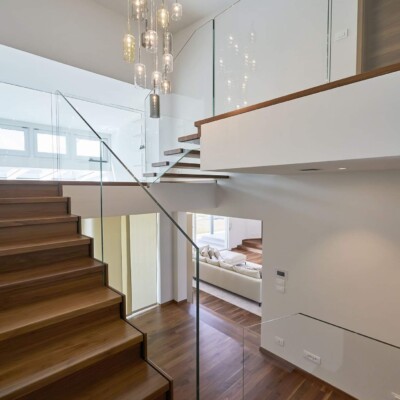 glass staircase with the stair parts and glass panels