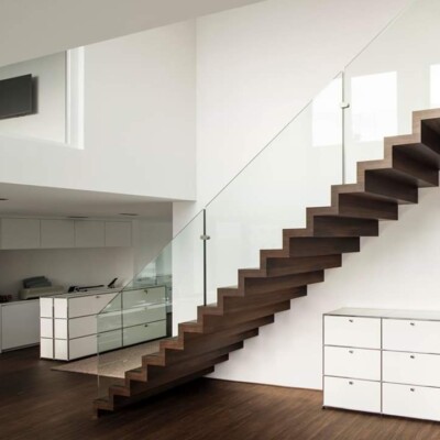 wide range of glass balustrades which are custom fitted to timber stairs
